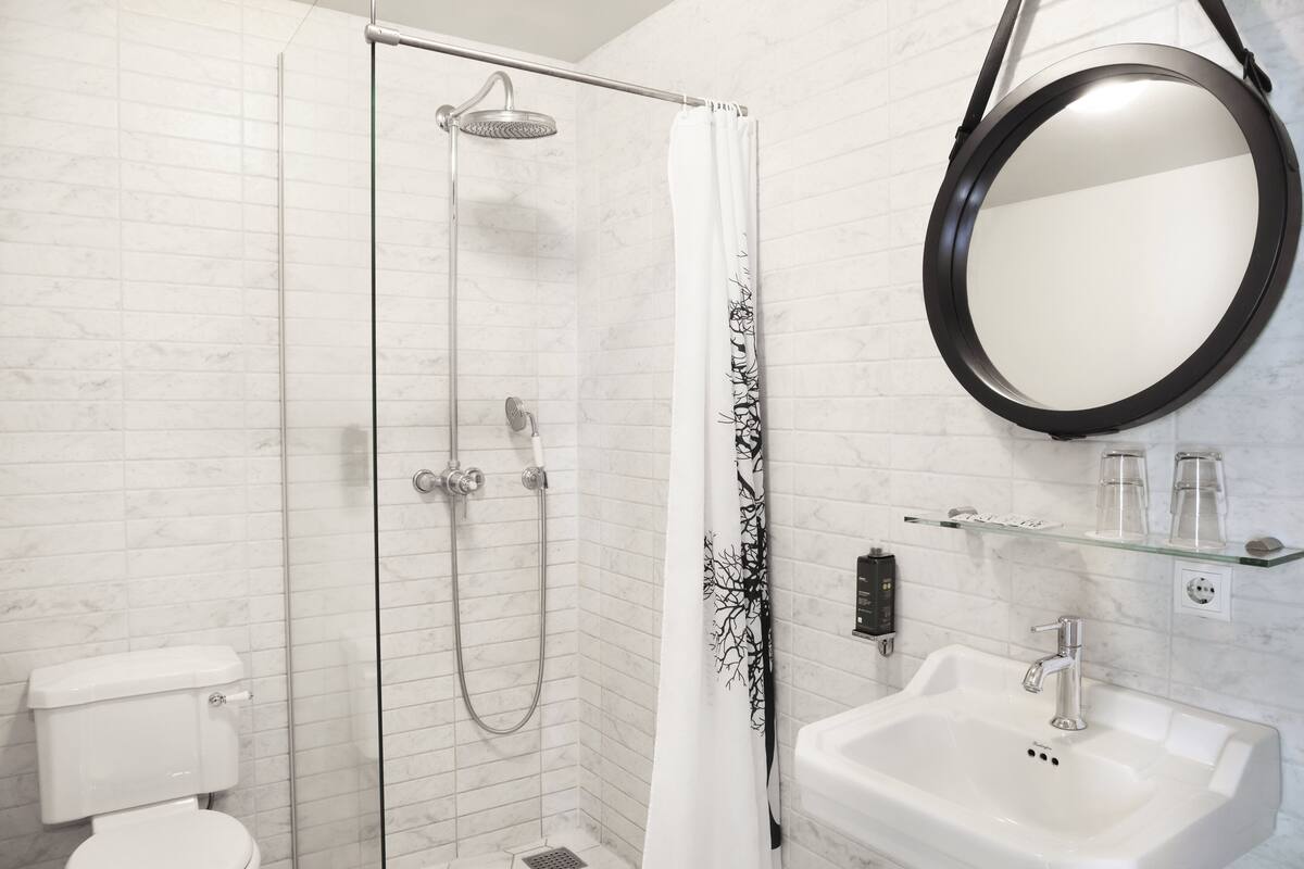 family room | bathroom | shower, hair dryer, towels