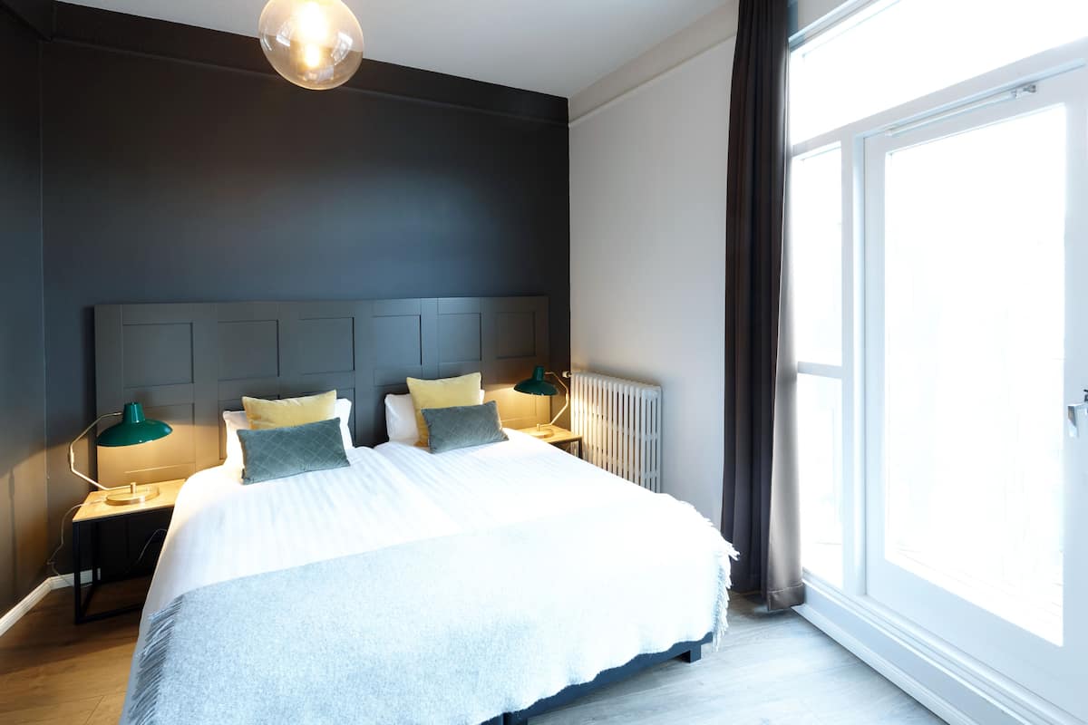 in-room safe, desk, blackout curtains, iron/ironing board