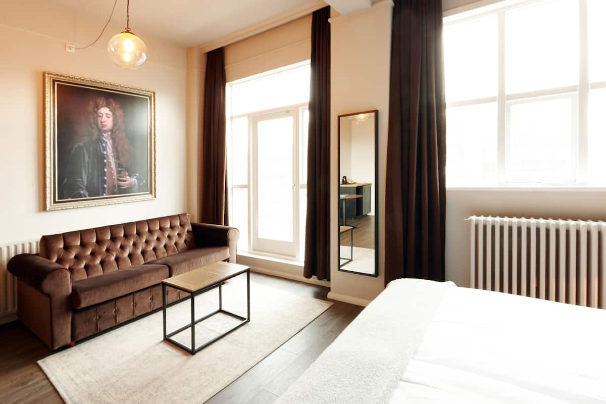 deluxe double room | in-room safe, desk, blackout curtains, iron/ironing board