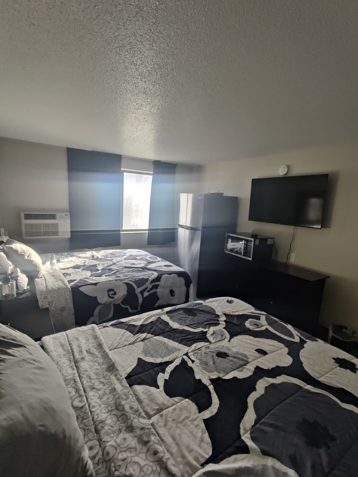 Premium bedding, down comforters, memory foam beds, desk