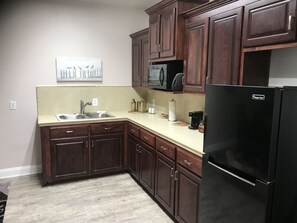 Presidential Room, 1 King Bed | Private kitchen | Fridge, microwave, coffee/tea maker