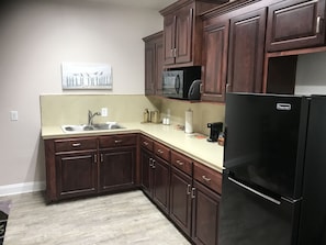 Presidential Room, 1 King Bed | Private kitchen | Fridge, microwave, coffee/tea maker