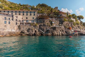 Overlooking the water, this building complex offers stunning views from its balconies and terraces.