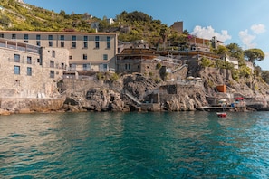 Overlooking the water, this building complex offers stunning views from its balconies and terraces.