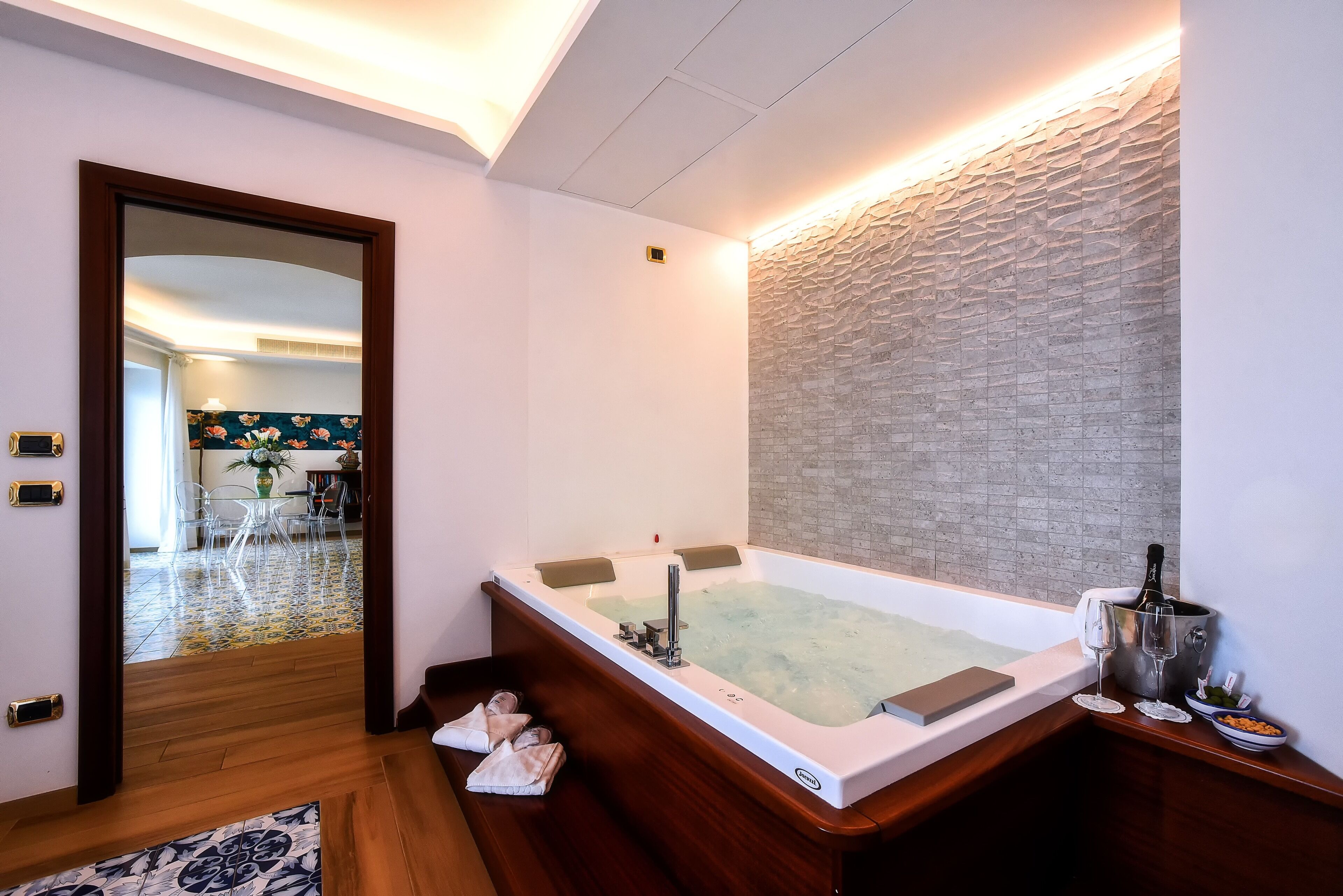 panoramic suite | bathroom | hair dryer, slippers, bidet, towels
