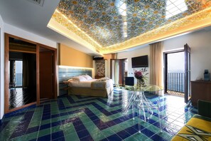 Junior Studio Suite, Balcony, Sea View | Minibar, in-room safe, desk, blackout drapes