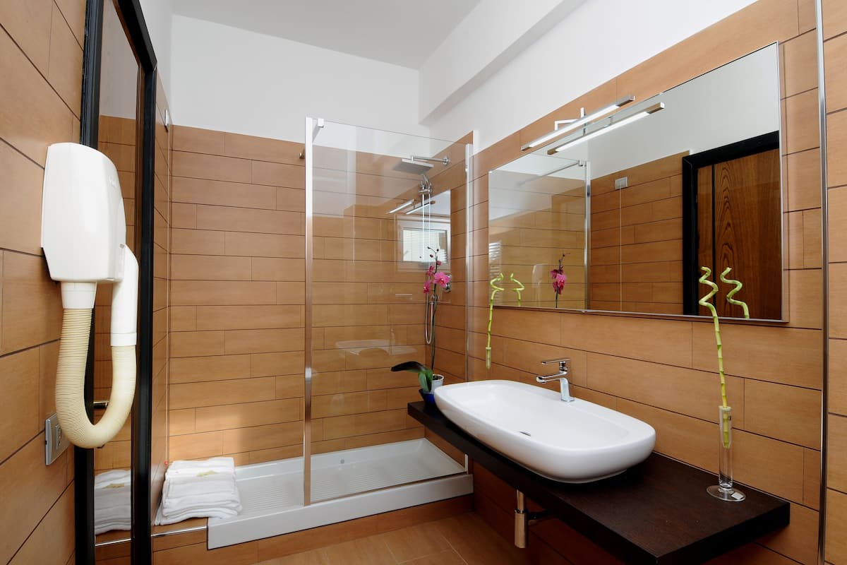 hair dryer, bidet, towels