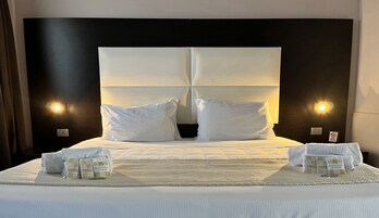 Down comforters, minibar, in-room safe, desk