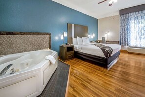 Premium bedding, desk, laptop workspace, blackout curtains