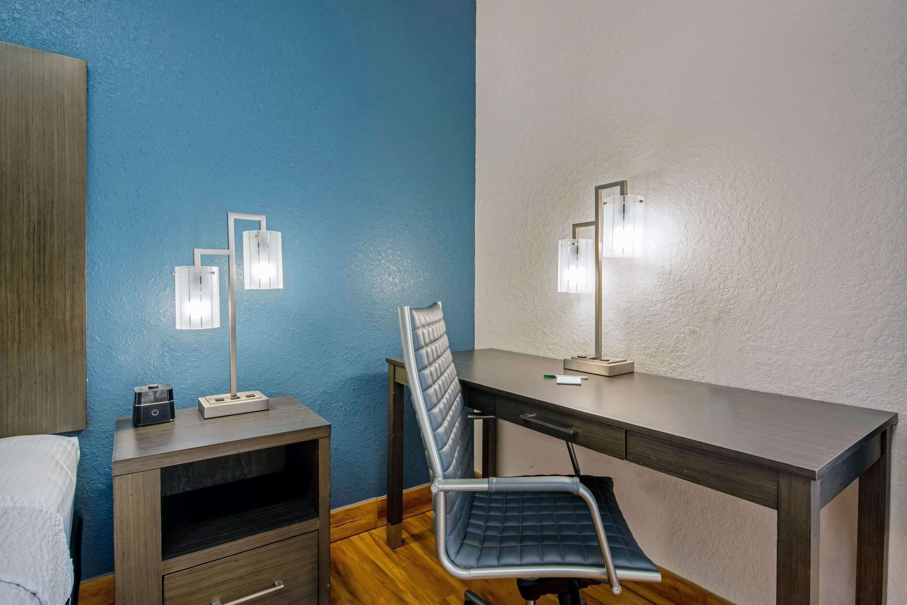 premium bedding, desk, laptop workspace, blackout curtains