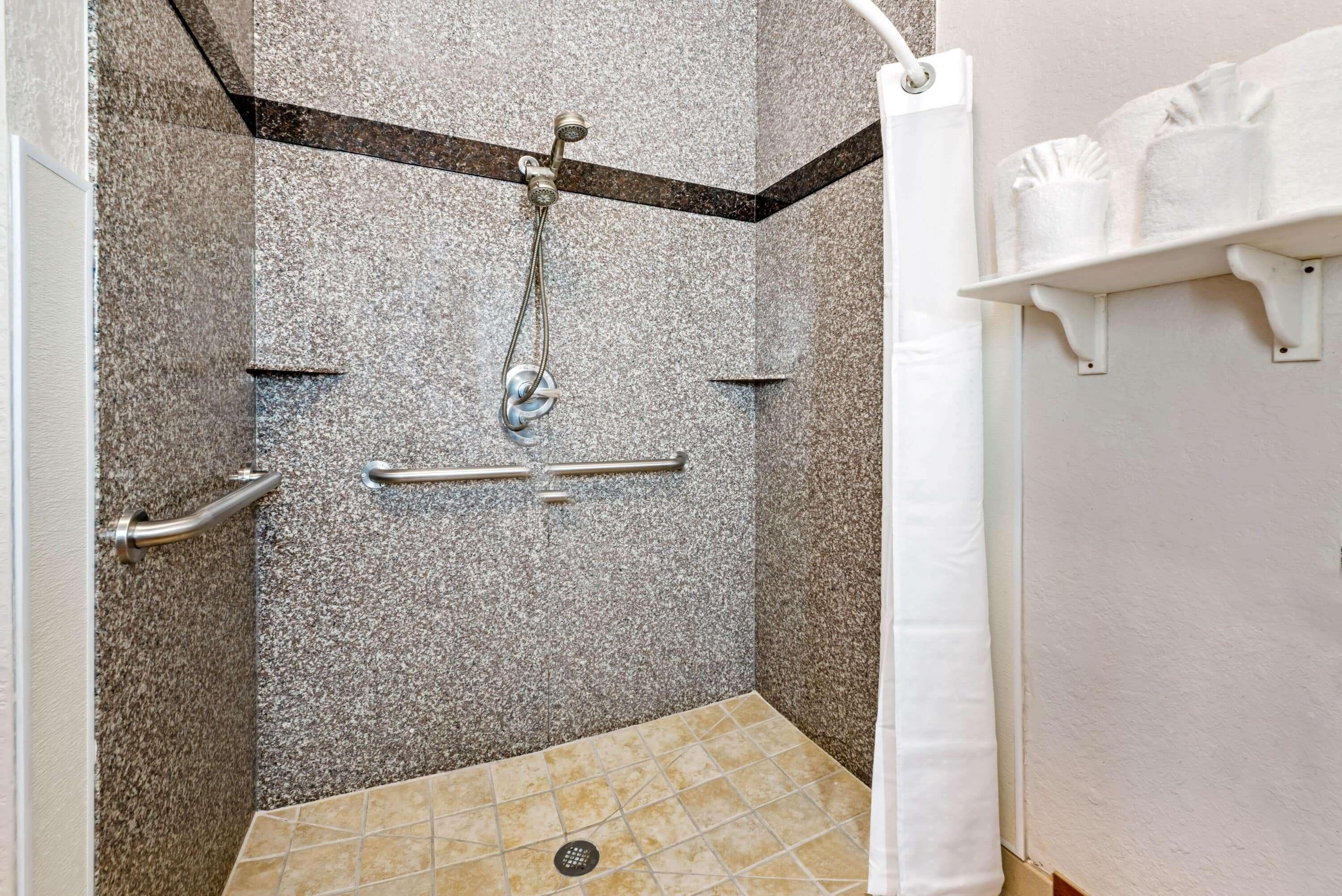 combined shower/bathtub, free toiletries, hair dryer, towels