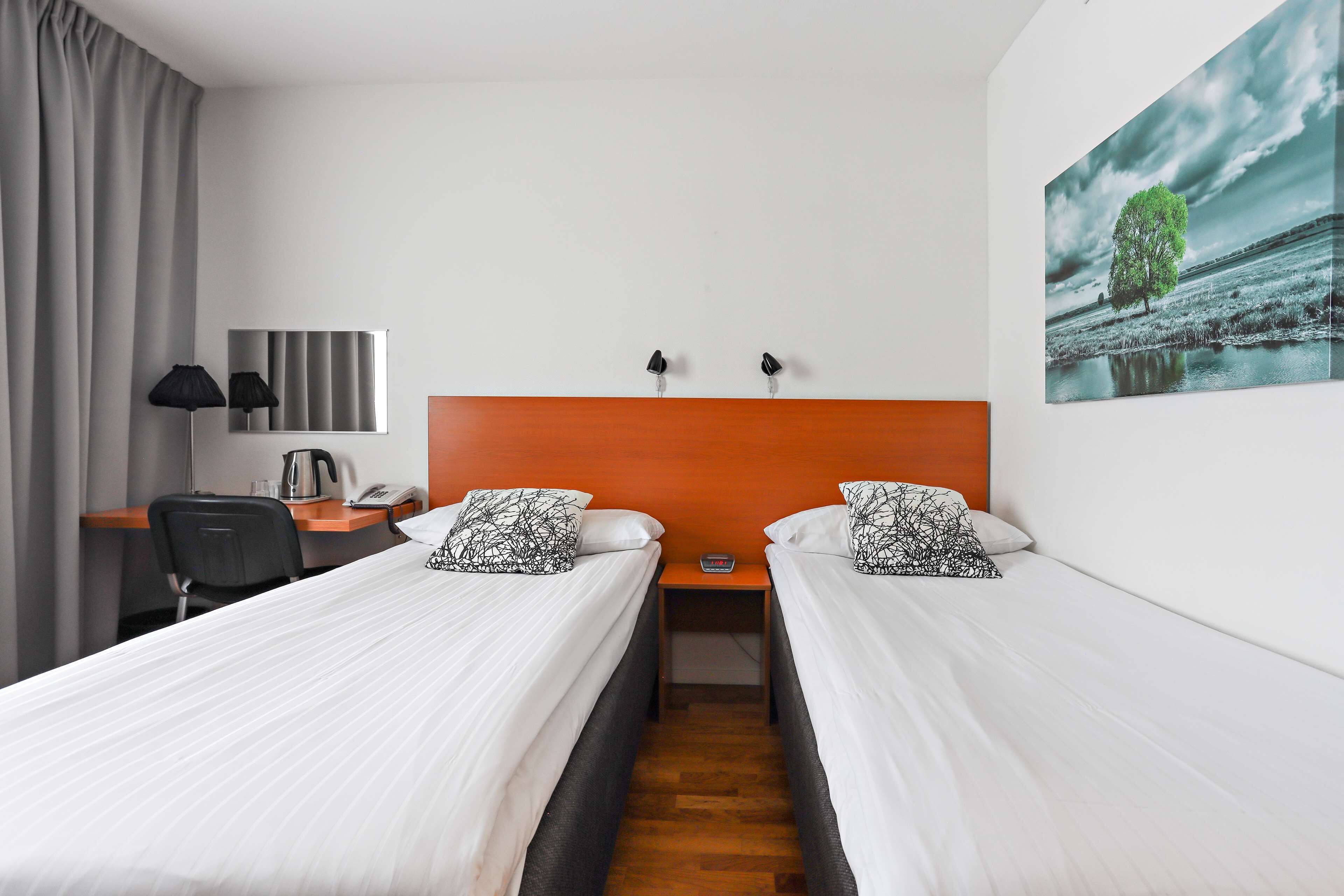 standard room, 2 single beds, non smoking | pillow-top beds, desk, blackout curtains, iron/ironing board