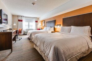 Hypo-allergenic bedding, down duvets, in-room safe, desk