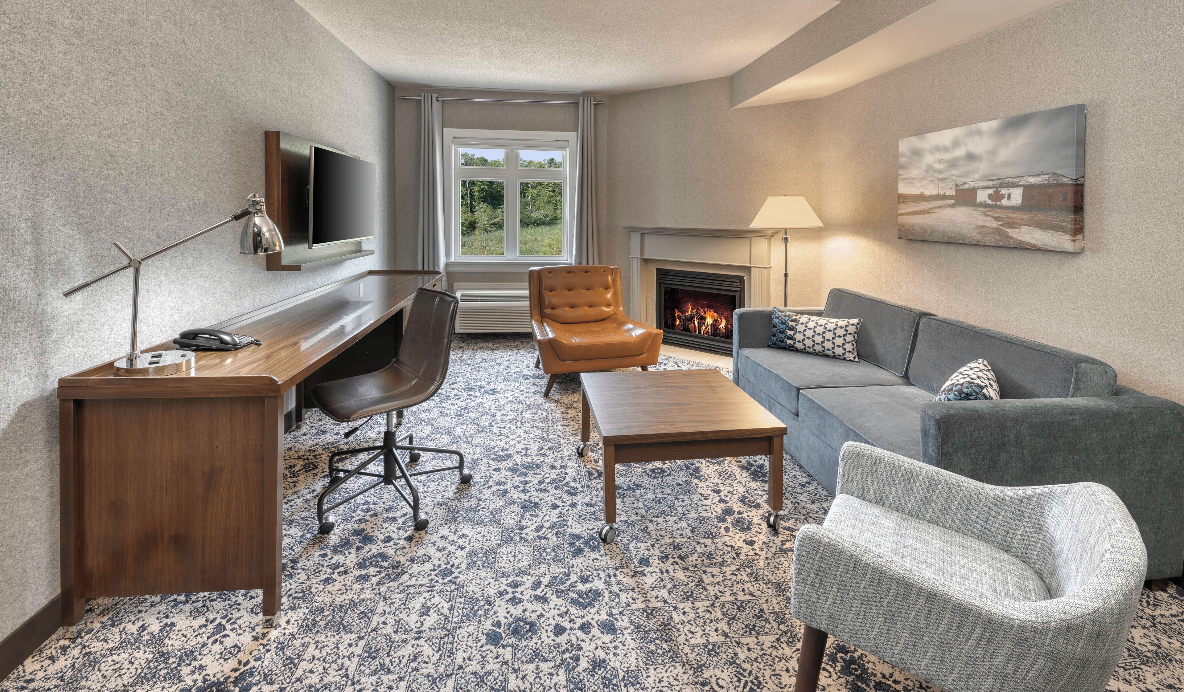 Suite, 1 Bedroom, Fireplace, Ground Floor | Hypo-allergenic bedding, down comforters, in-room safe, desk