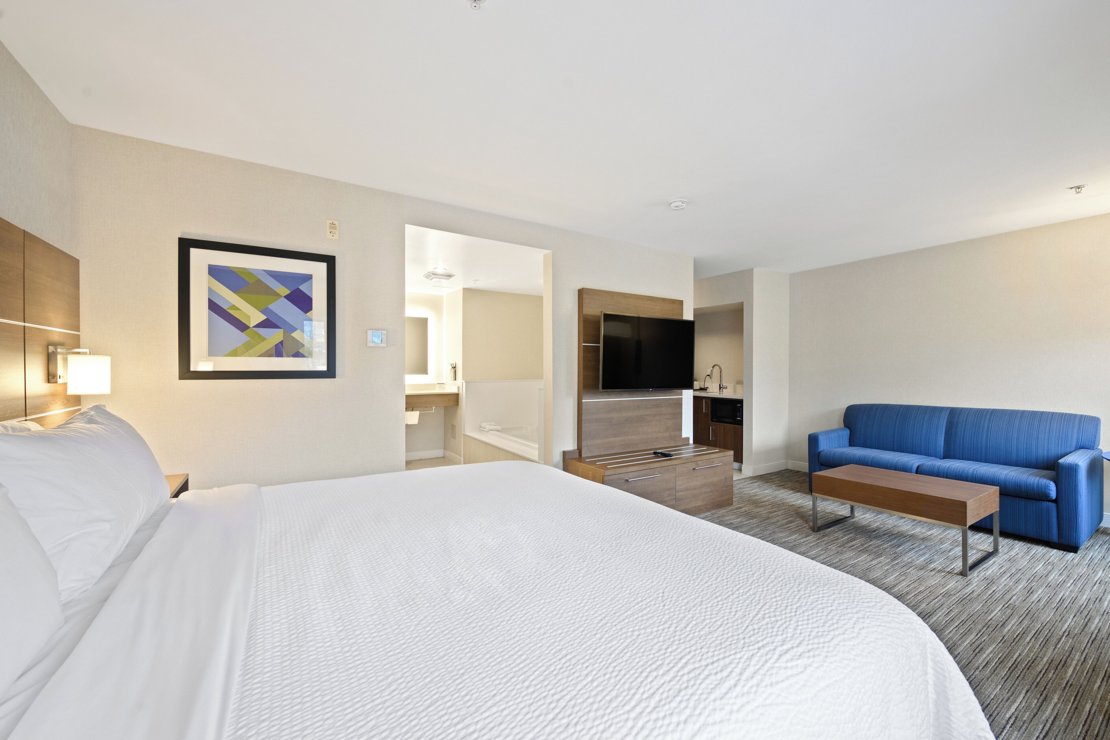 Suite, 1 King Bed | In-room safe, desk, iron/ironing board, free cribs/infant beds