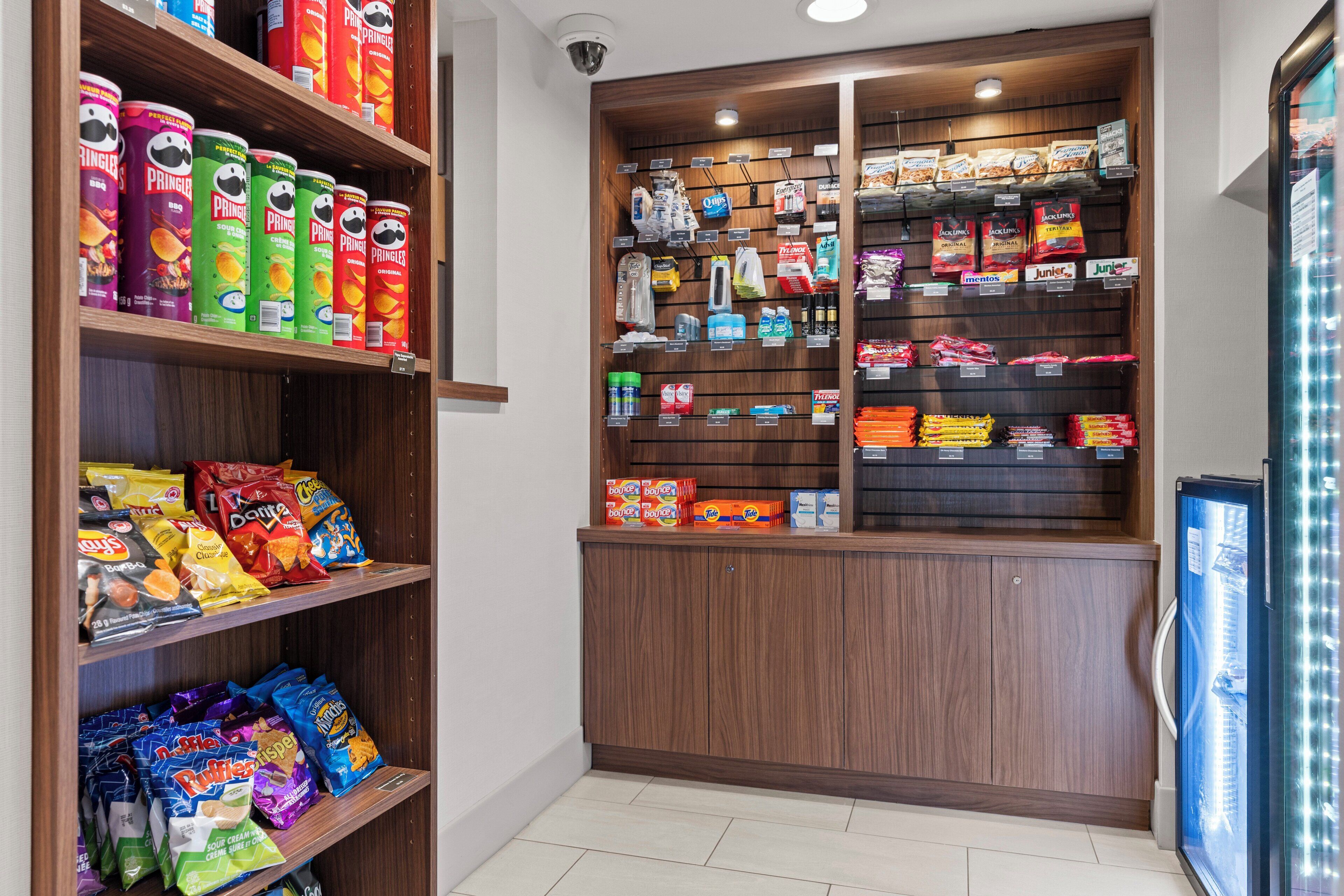 A snack display with various chips and snacks.