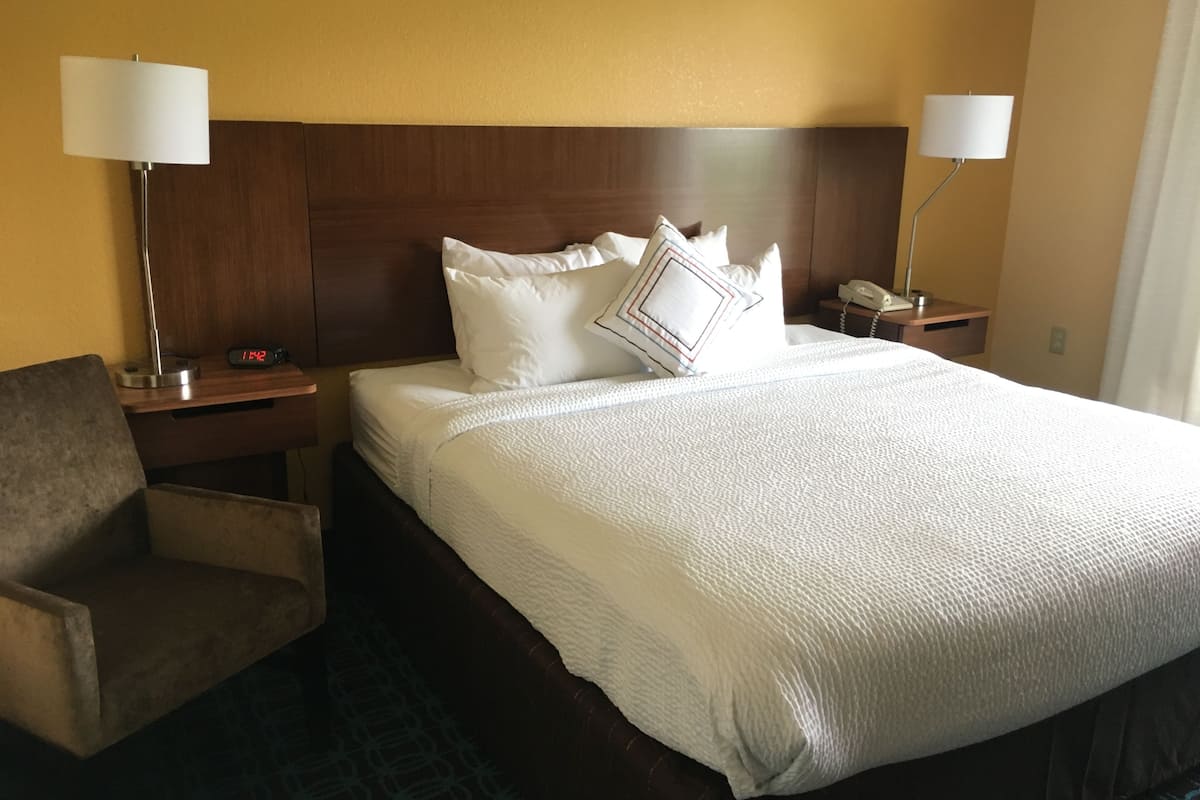 room, 1 king bed, non smoking | desk, laptop workspace, blackout curtains, iron/ironing board