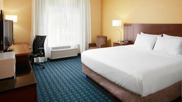 Desk, laptop workspace, blackout drapes, iron/ironing board