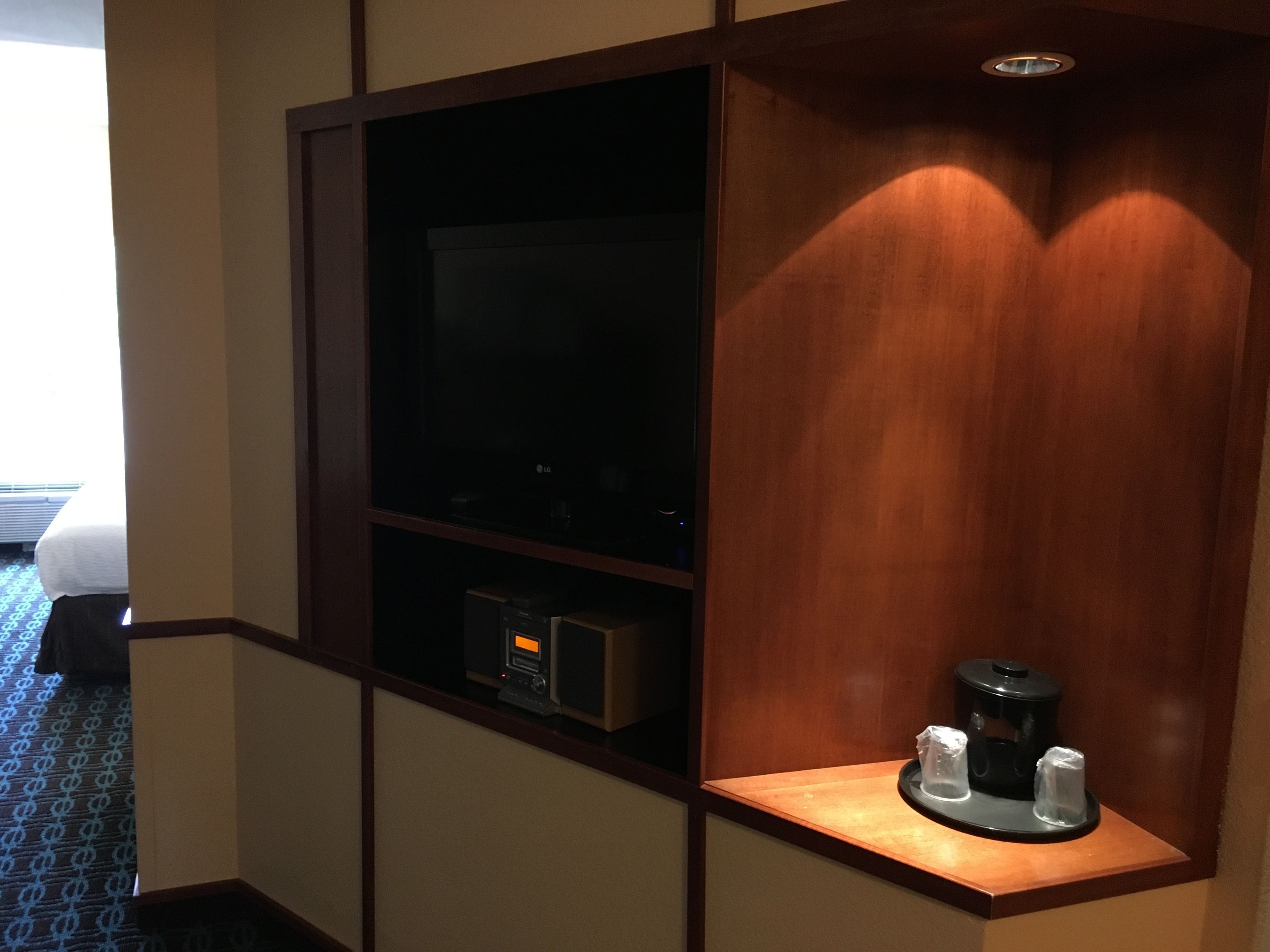 desk, laptop workspace, blackout curtains, iron/ironing board