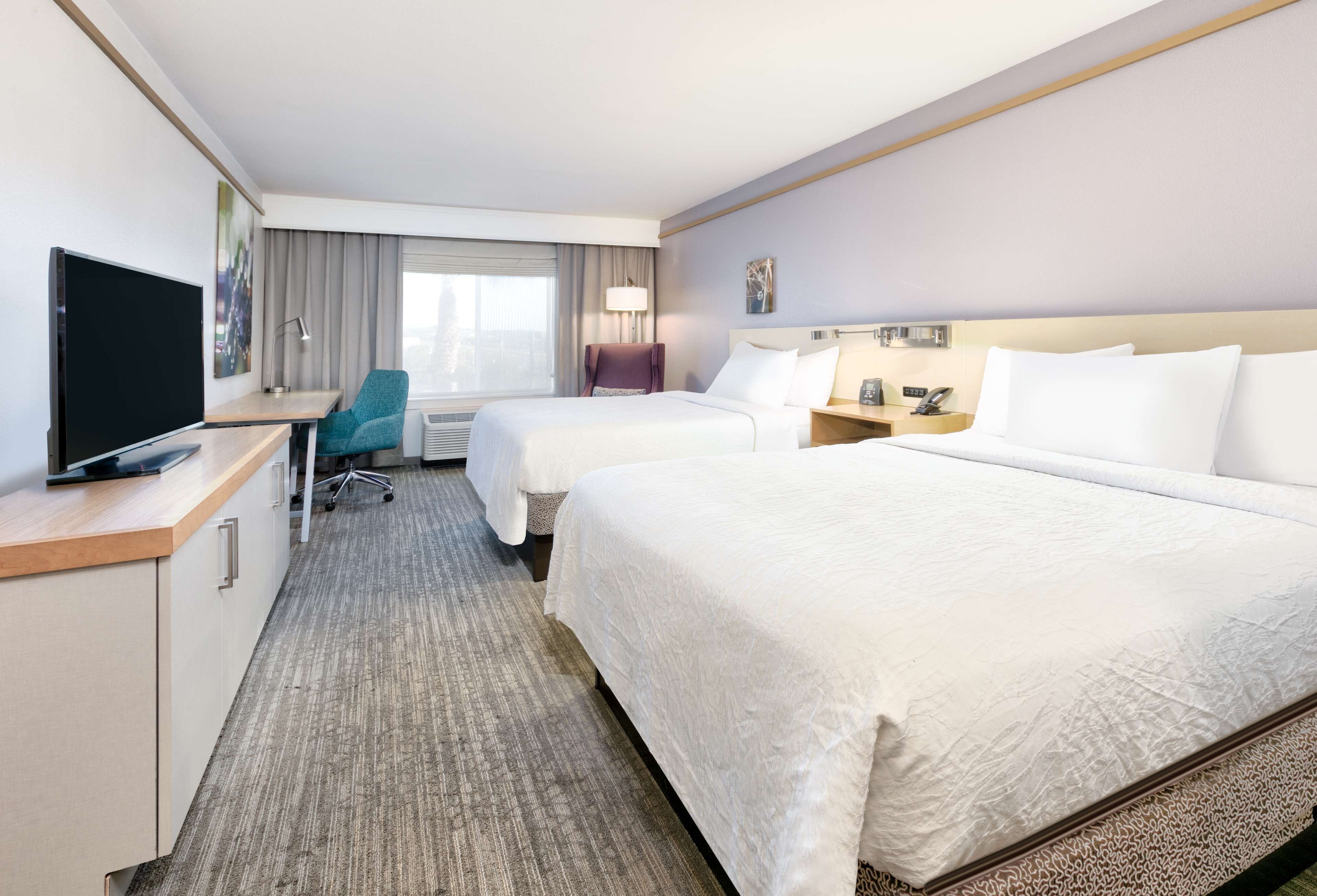 room, 2 queen beds | premium bedding, in-room safe, desk, laptop workspace