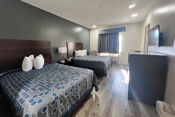 Standard Room, 2 Queen Beds, Non Smoking | Individually decorated, individually furnished, desk, laptop workspace