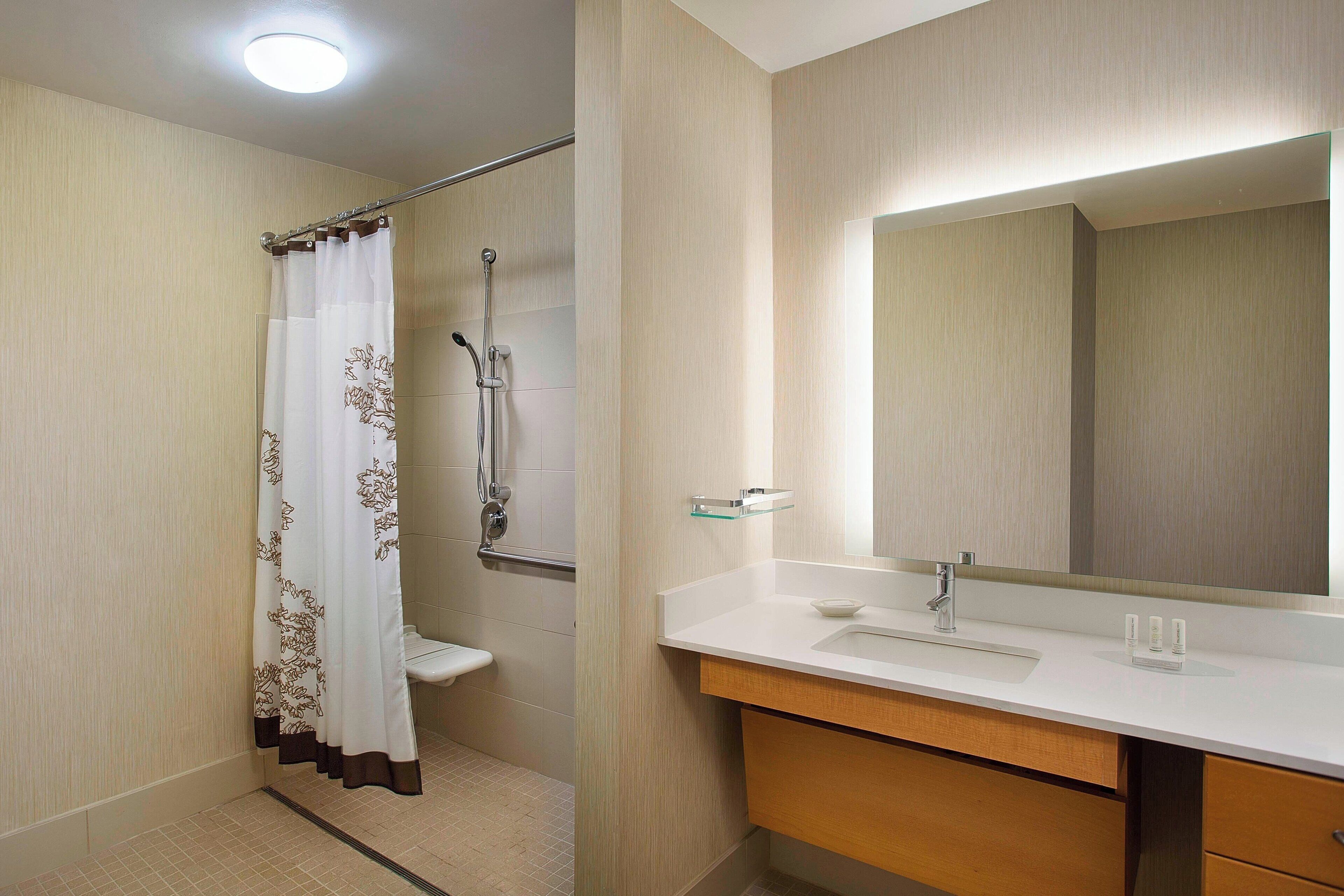 combined shower/bathtub, free toiletries, hair dryer, towels