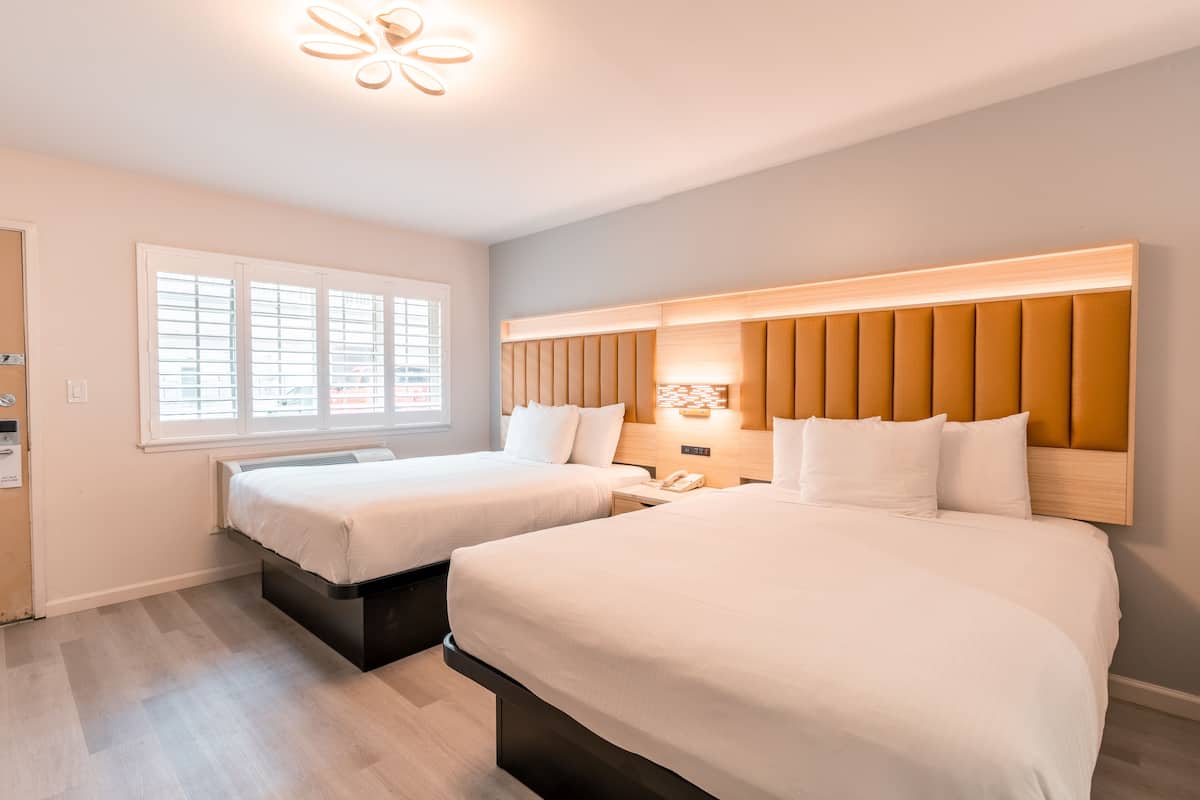 Deluxe Room, 2 Queen Beds | 1 bedroom, in-room safe, iron/ironing board, free WiFi