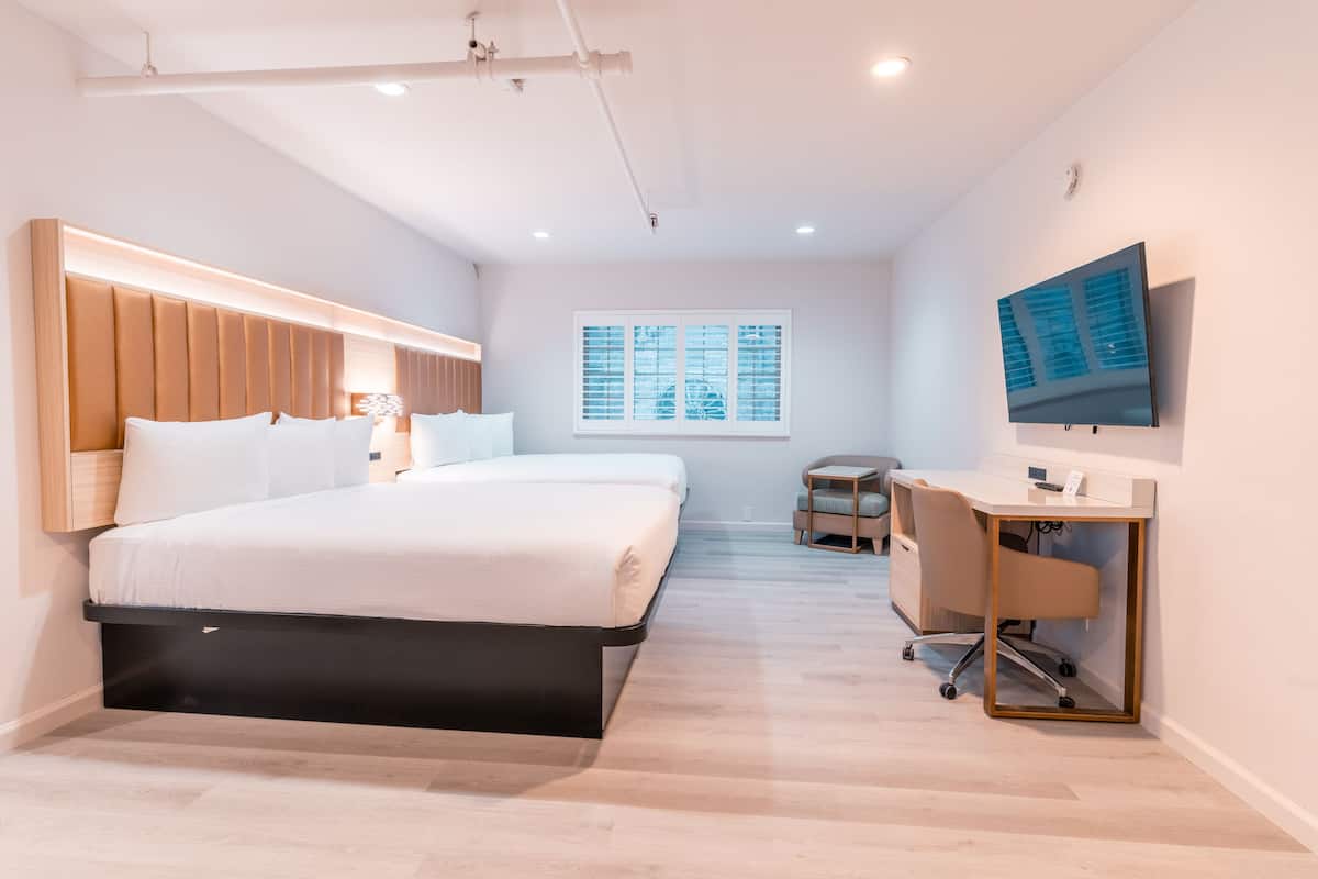 Family Suite, Multiple Beds | 1 bedroom, in-room safe, iron/ironing board, free WiFi