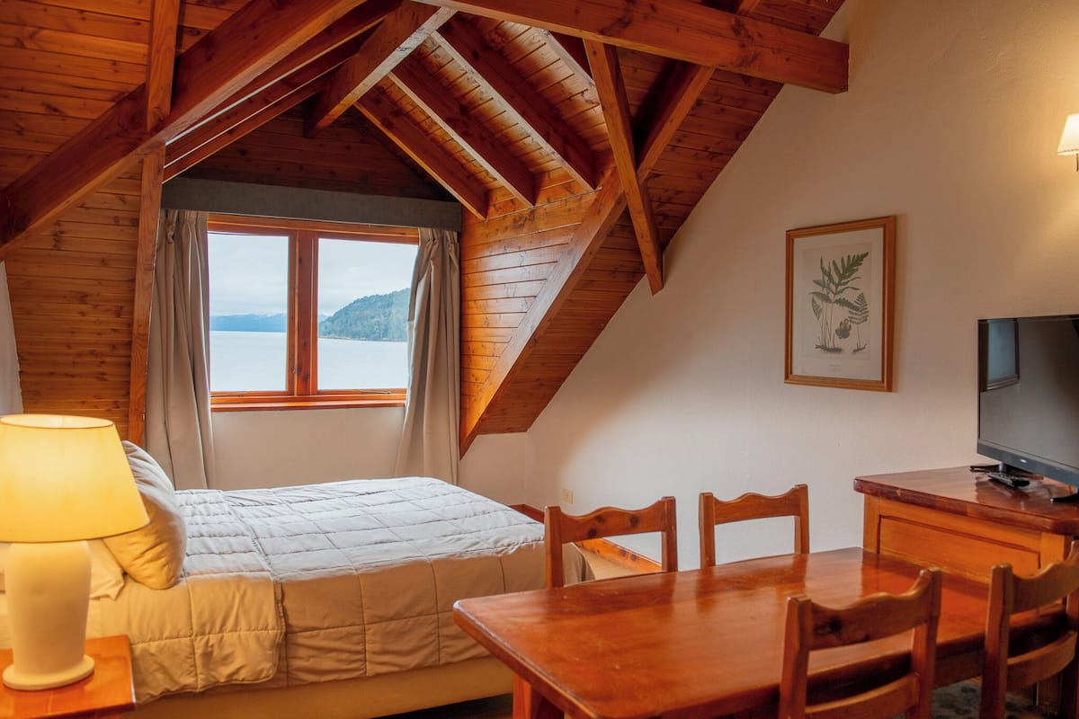 Standard Studio, Lake View | Living area | 42-inch LCD TV with cable channels