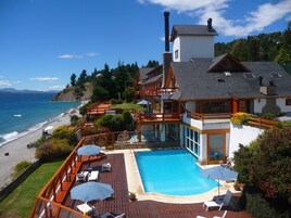Indoor pool, outdoor pool, open 9 AM to 9 PM, sun loungers