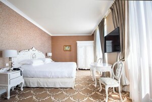 Quarto luxo, vista para o jardim | Roupas de cama premium, frigobar (abastecido com itens grátis)