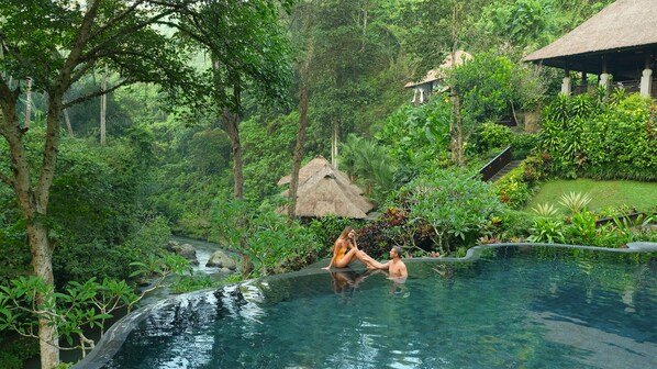 2 outdoor pools, open 8:00 AM to 8:00 PM, free pool cabanas