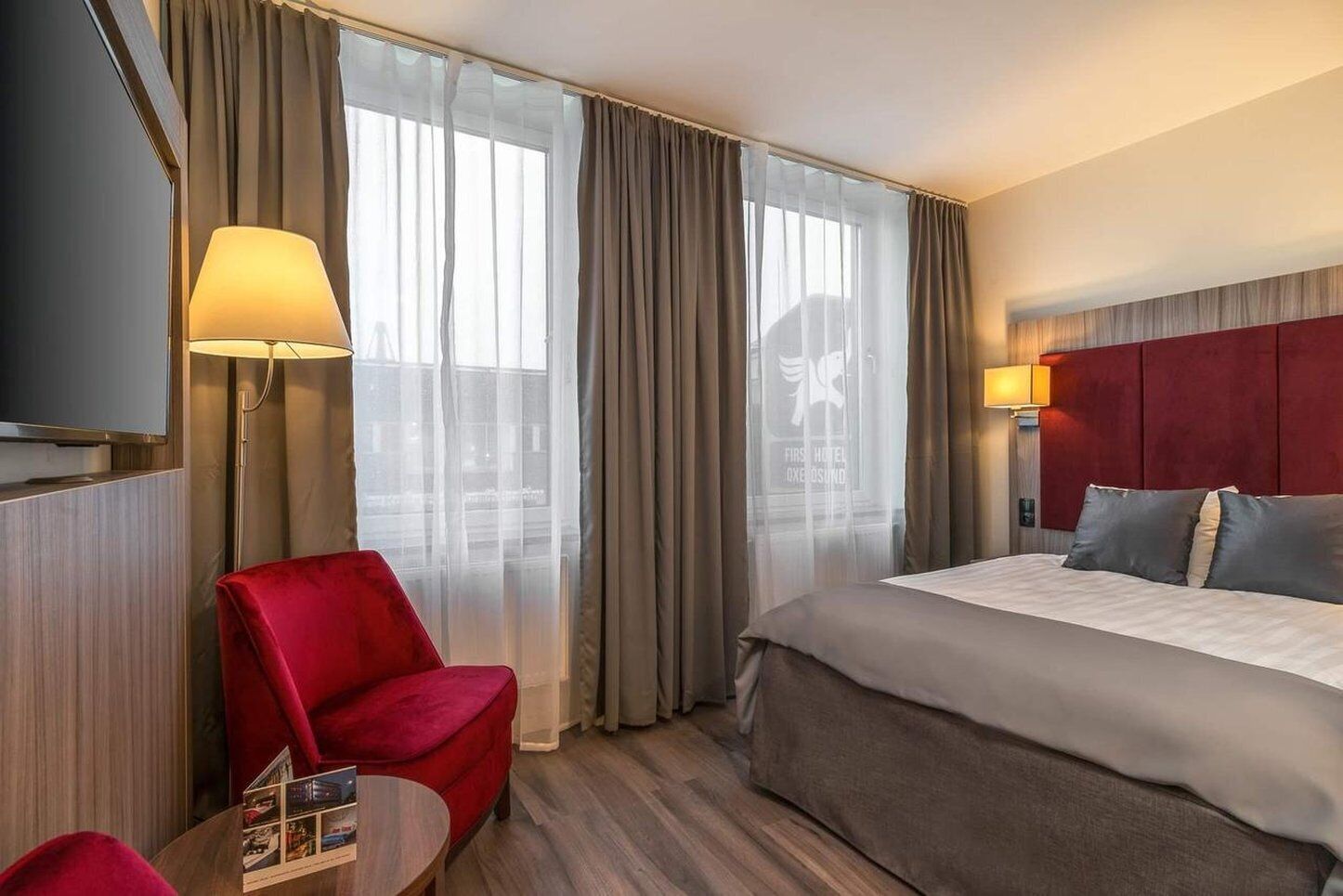 blackout curtains, free wifi, bed sheets, alarm clocks