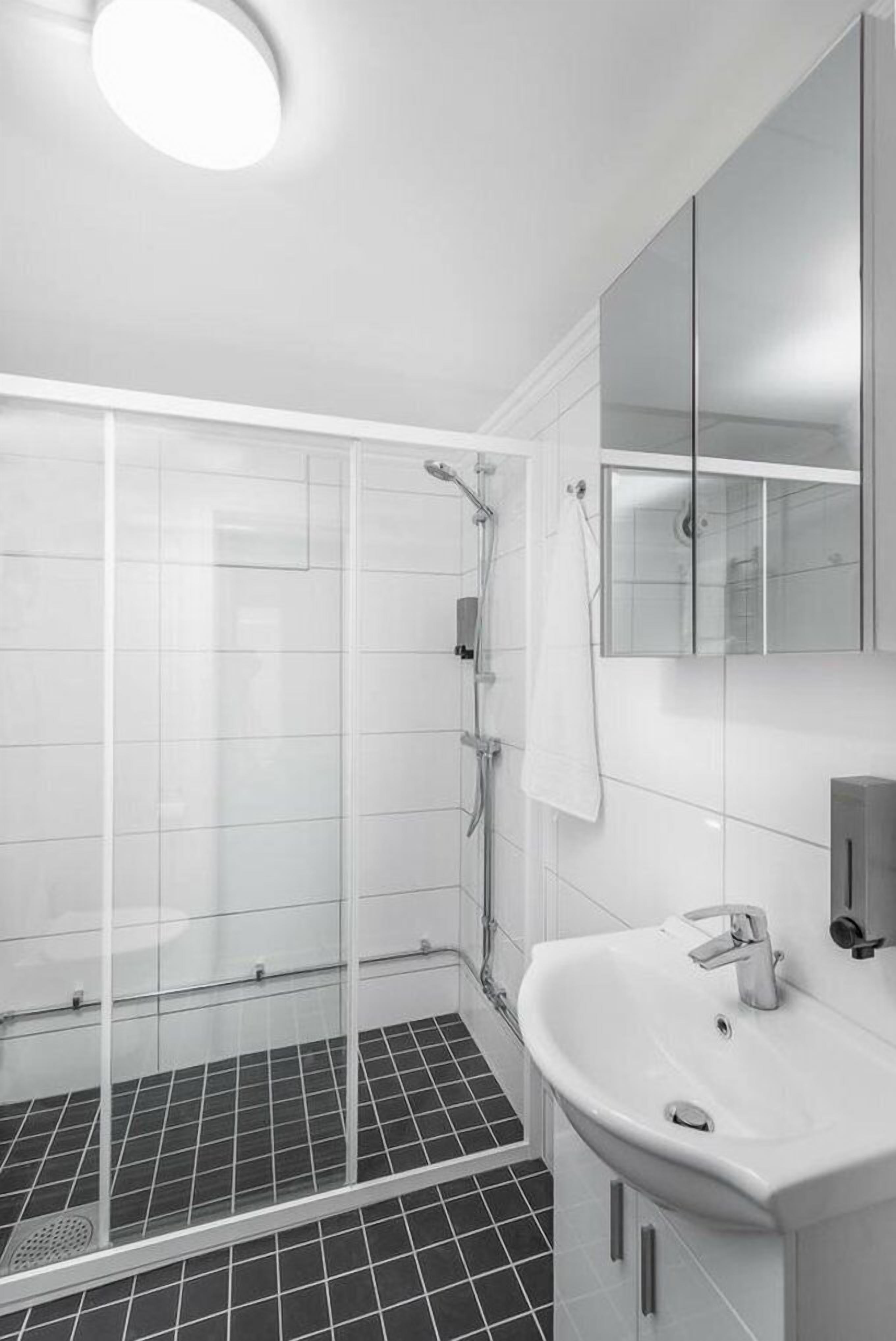 blackout curtains, free wifi, bed sheets, alarm clocks