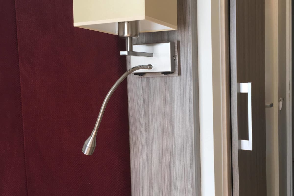 blackout curtains, free wifi, bed sheets, alarm clocks