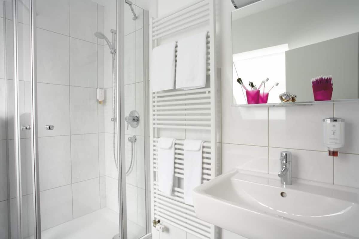 apartment | bathroom | eco-friendly toiletries, hair dryer, bathrobes, slippers