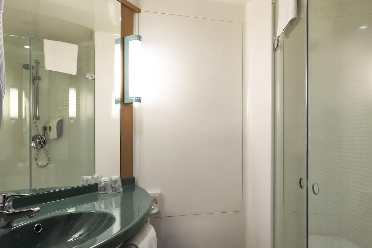 Room, 2 Twin Beds | Down comforters, desk, blackout drapes, iron/ironing board