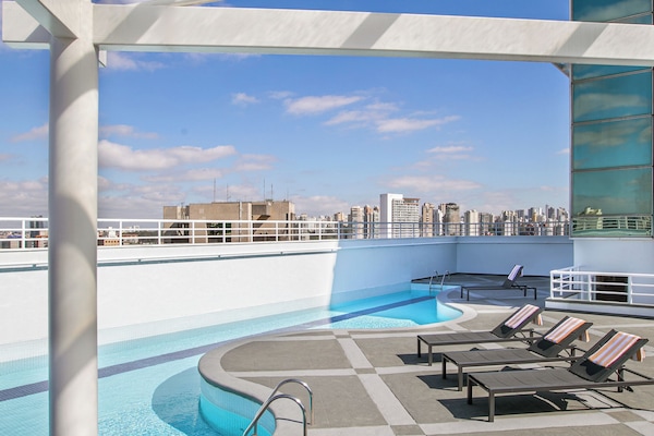 Outdoor pool, open 8:00 AM to 8:00 PM, sun loungers