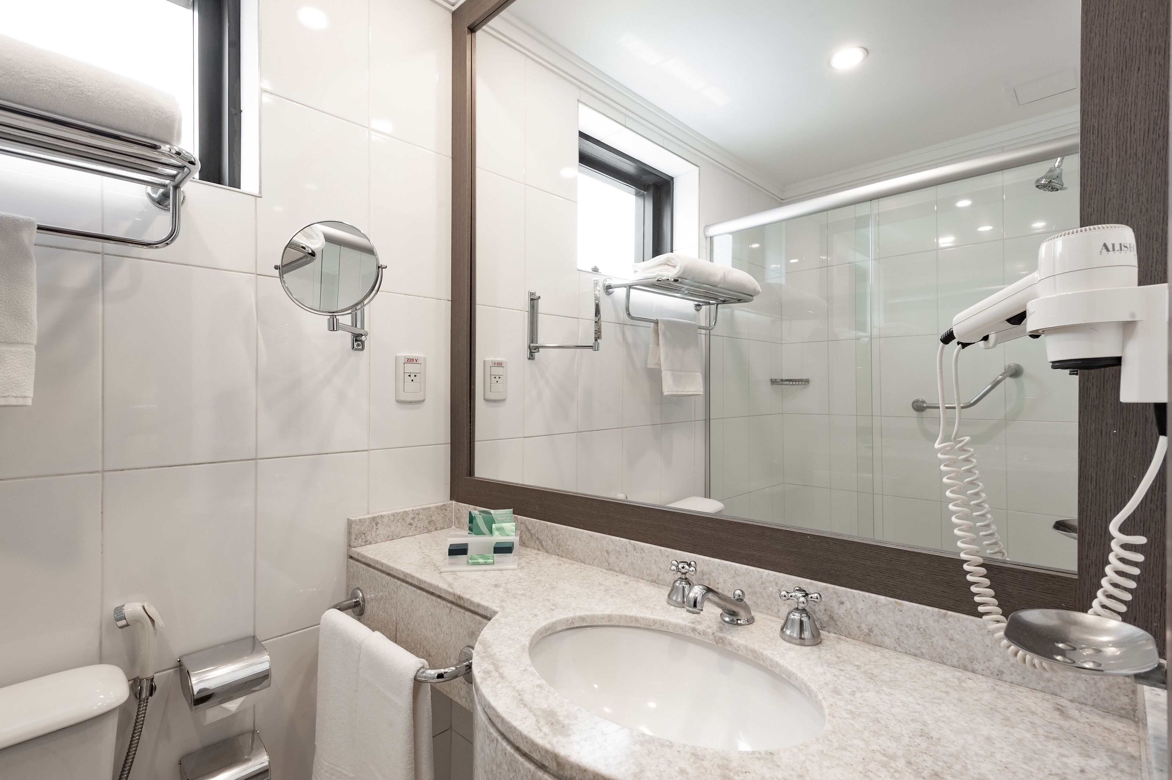 premium double room | bathroom | shower, hair dryer, towels