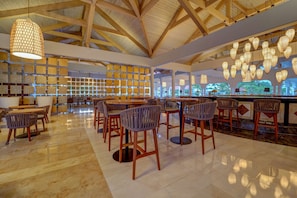 2 bars/lounges, swim-up bar, poolside bar, beach bar