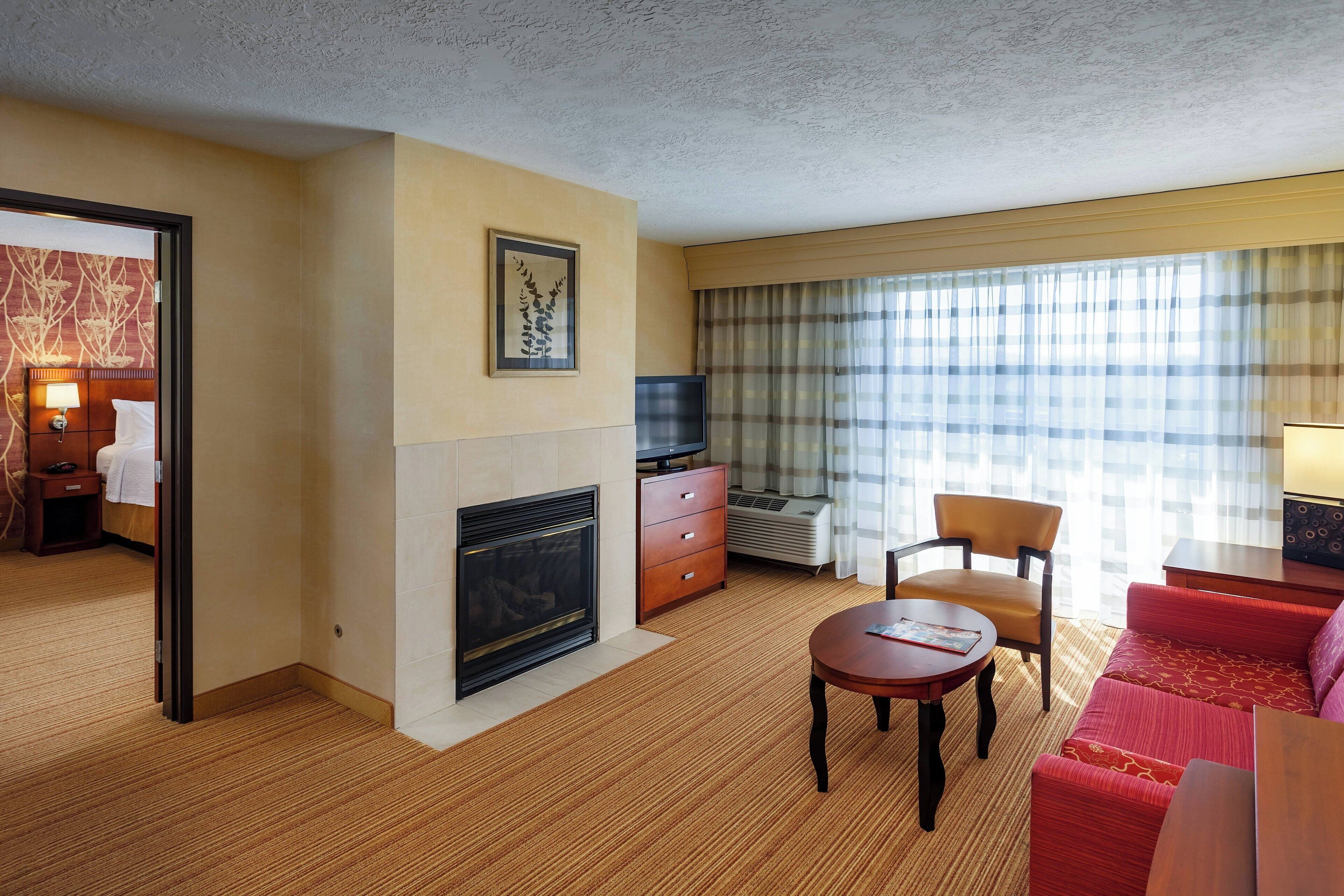 premium bedding, desk, laptop workspace, iron/ironing board