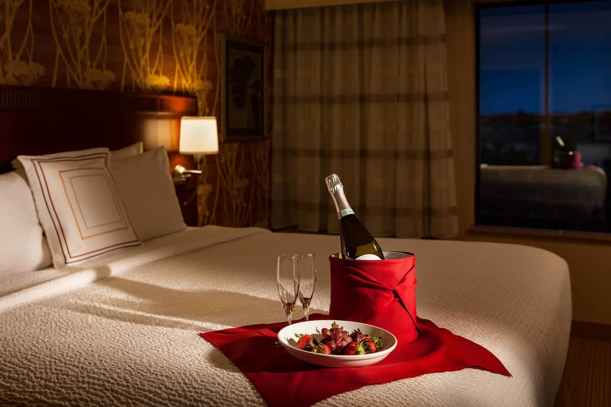 premium bedding, desk, laptop workspace, iron/ironing board