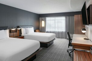 Premium bedding, desk, laptop workspace, iron/ironing board