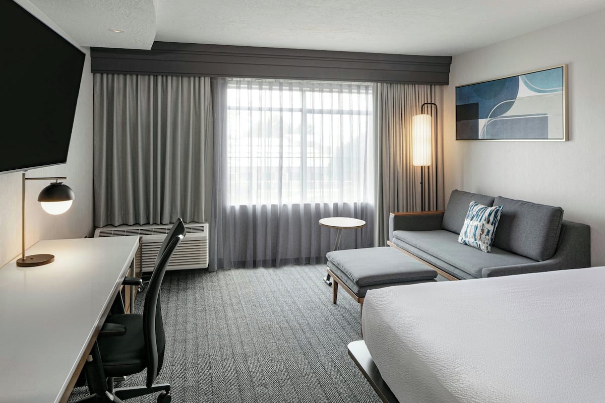 Room, 1 King Bed with Sofa bed, City View | Premium bedding, desk, laptop workspace, iron/ironing board