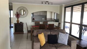 Penthouse Apartment | Living room | 42-inch flat-screen TV with satellite channels, TV