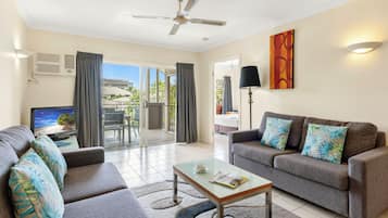 Standard Apartment, 2 Bedrooms | Living area | TV