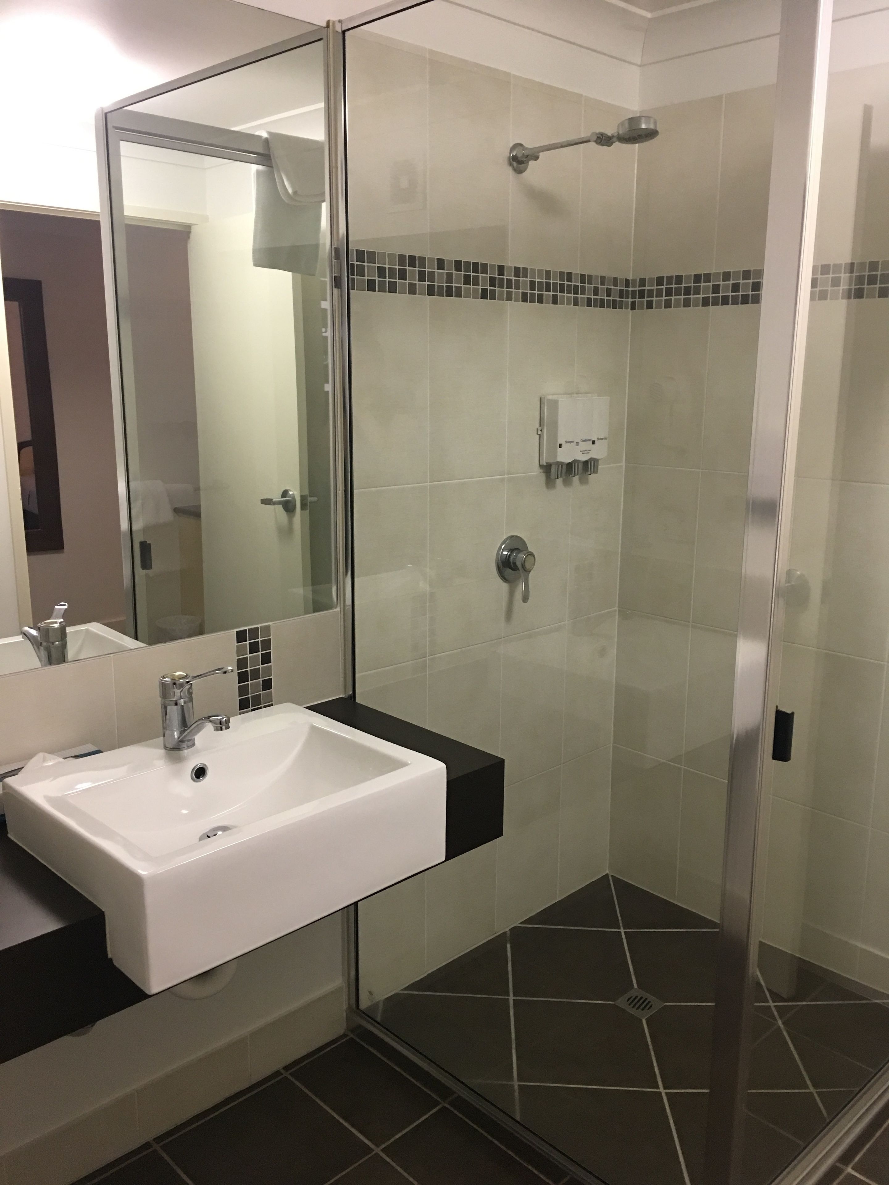 shower, free toiletries, hair dryer, towels