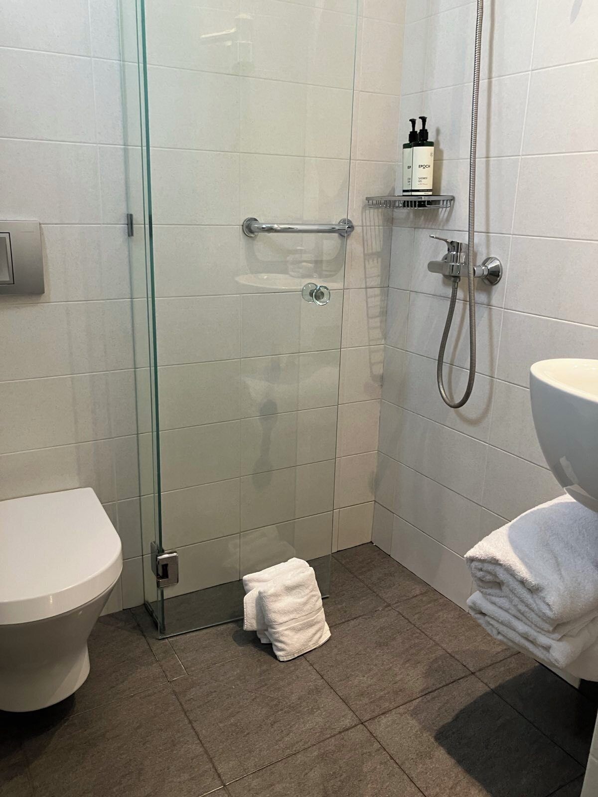 small comfort room, balcony | bathroom | shower, free toiletries, hair dryer, towels