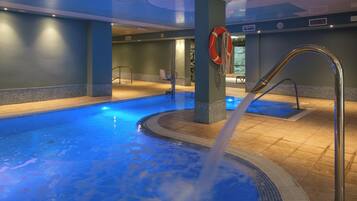 Indoor pool, outdoor pool, pool umbrellas, sun loungers