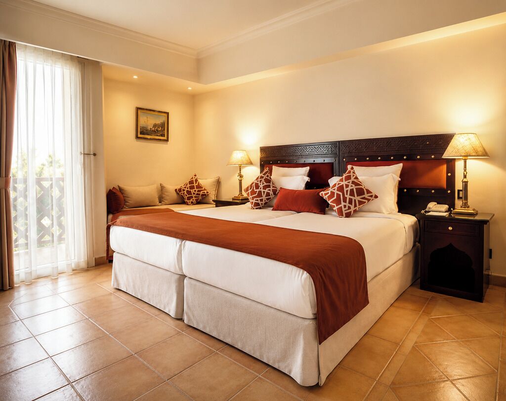 Ropa de cama de alta calidad, minibar, escritorio